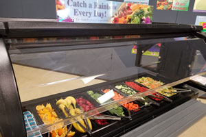 New food bar stocked with fruits and vegetables