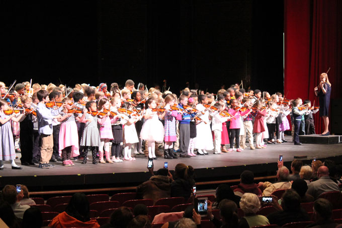 LCS Strings students on stage at the Suzuki Festival