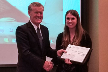 Kirsten Filiberto receiving Air Force Association Teacher of the Year award