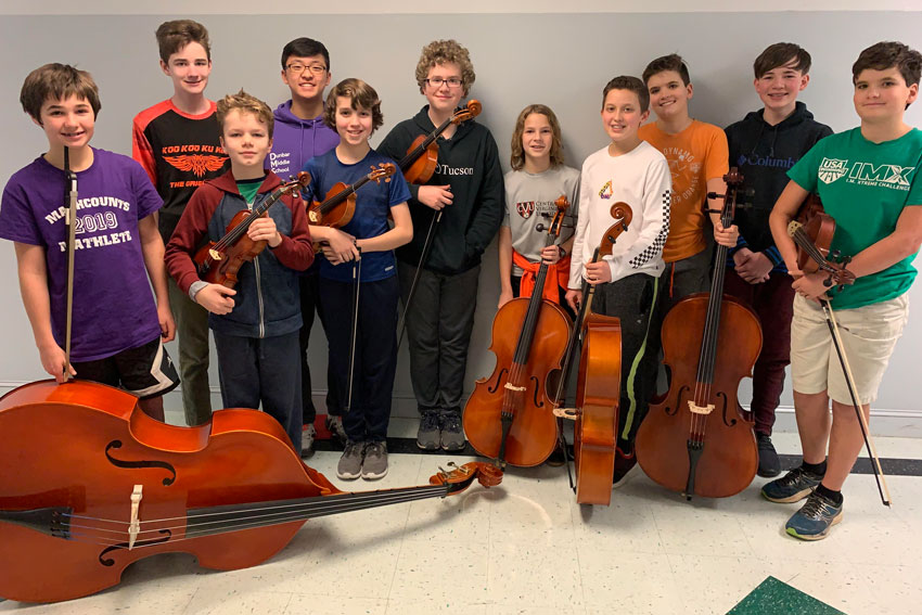 Group of students with string instruments