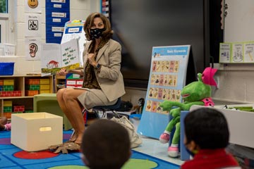First Lady Pamela Northam reading to class