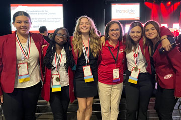 Teacher and five students at Family, Career and Community Leaders of America National Leadership and Recognition Conference in Denver, Colorado