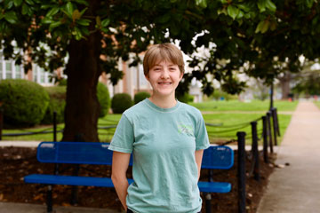 Lindley Crosby outside E. C. Glass High School