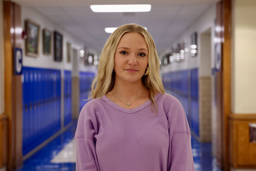 Lucy White in E. C. Glass hallway