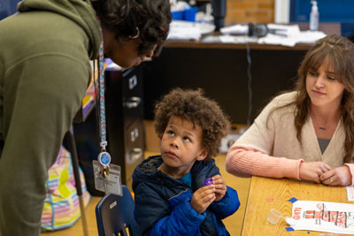 Student looking up at teacher