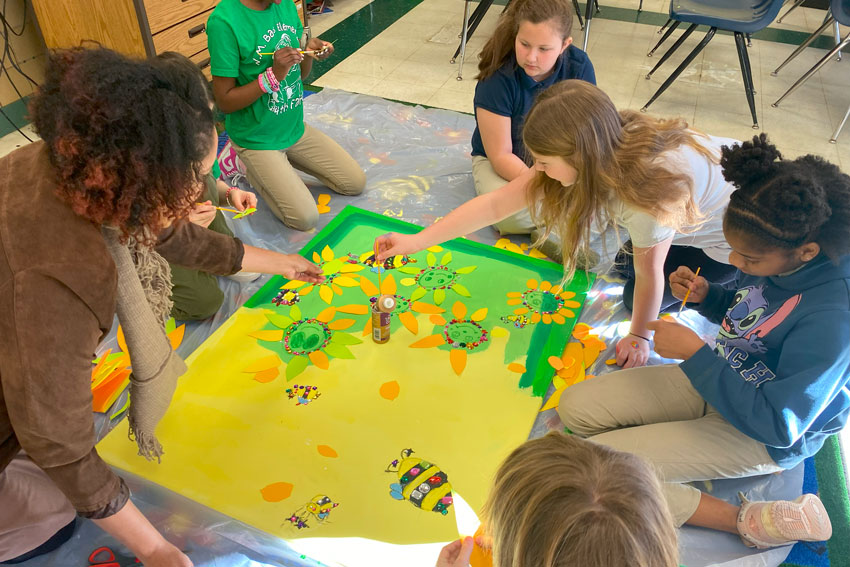 Students painting mural