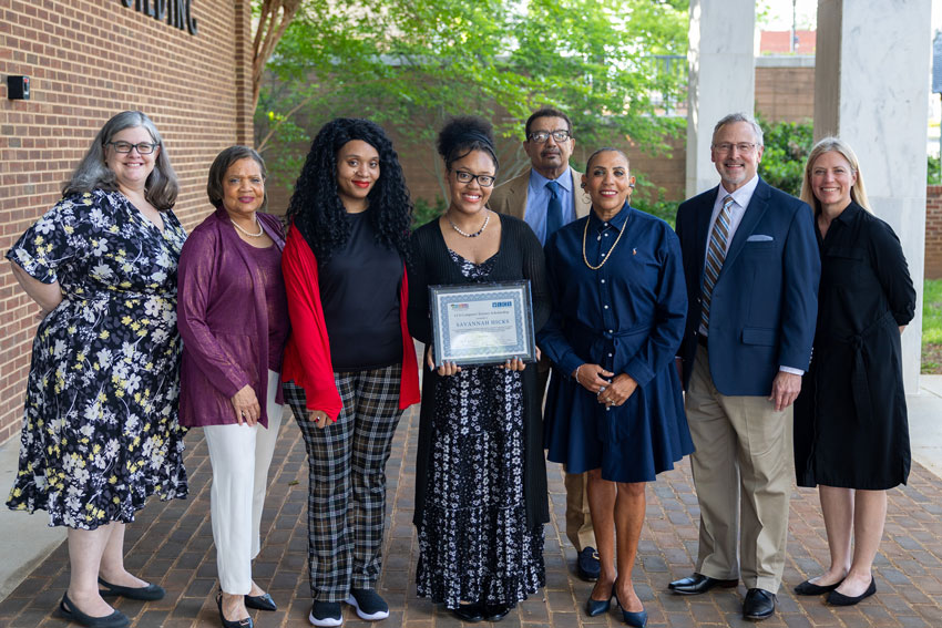 Computer Science Scholarship winner Savannah Hicks with mother, donors and educators.
