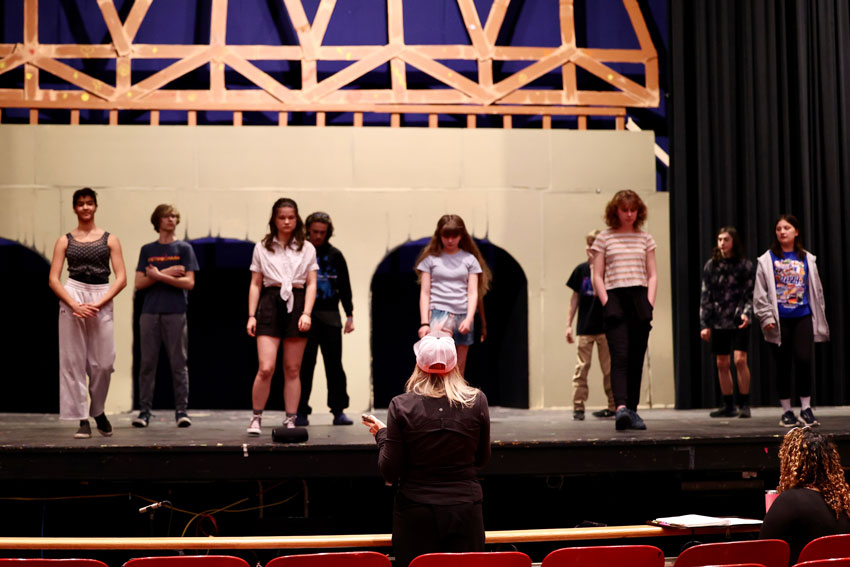 Choreographer speaking to students during rehearsal