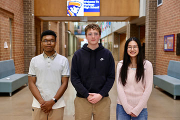 HHS students Joey Martin, Lyndon Bierlein, and Serena Guo