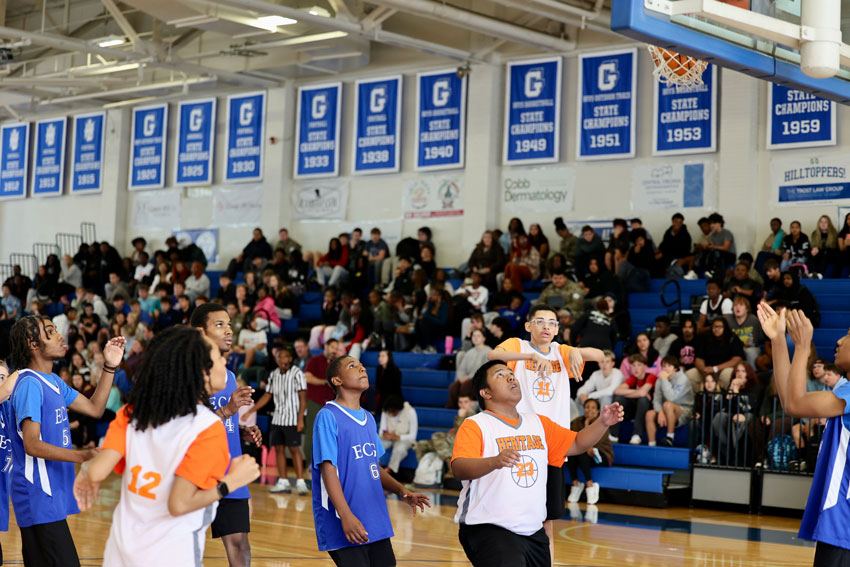 Heritage and Glass Medford League basketball players on court during game