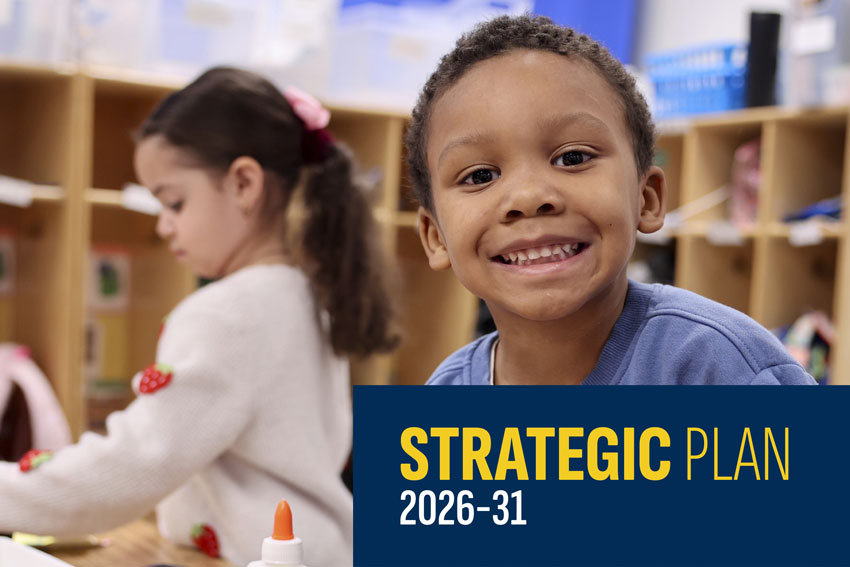 Smiling student with "Strategic Plan: 2026-31" in block of text 