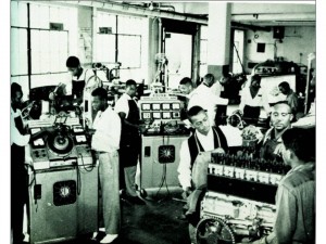 African-American students working in auto shop class