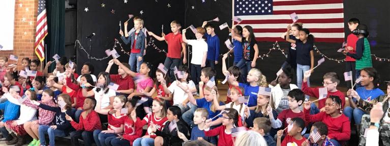 3rd grade play waving flags