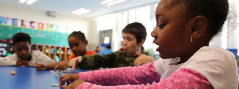 Students at table counting