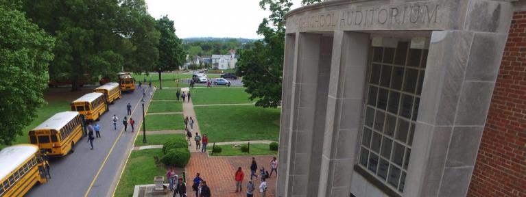 ECG auditorium and buses photographed from above