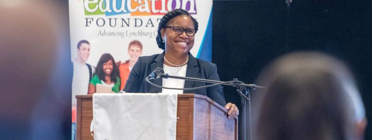 Dr. Edwards speaking at Education Foundation breakfast