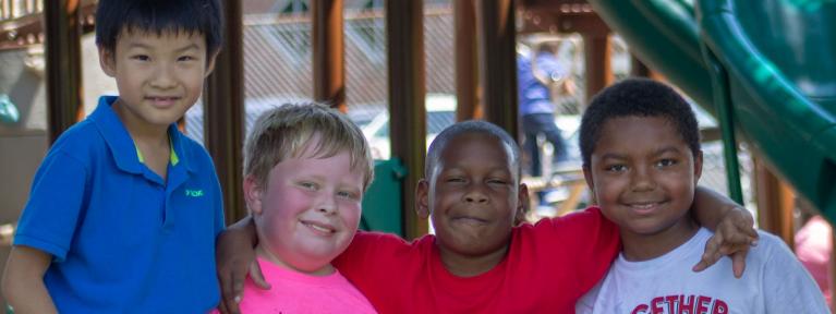 Four boys on the playground