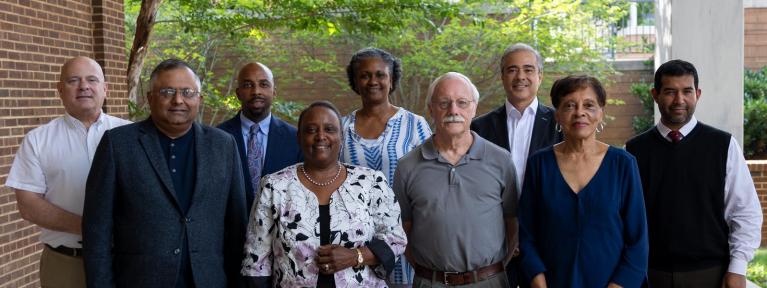 School board members standing outside