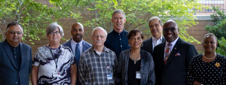 School board members standing outside