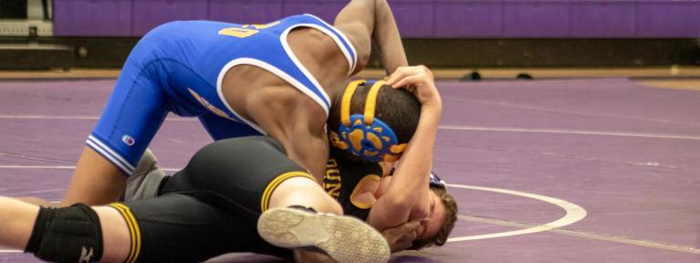 Wrestler on top of opponent